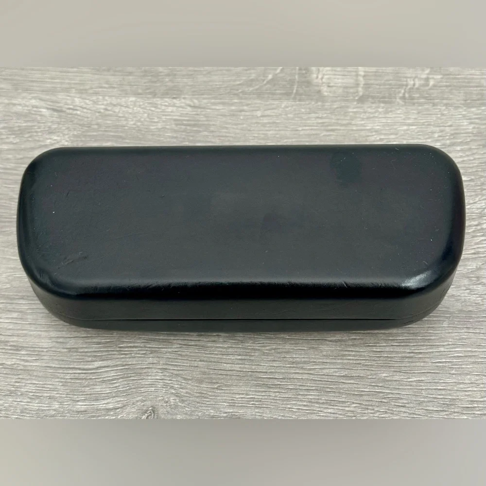 COACH New York Glasses case Black. Used. Has some small dents. See photo.